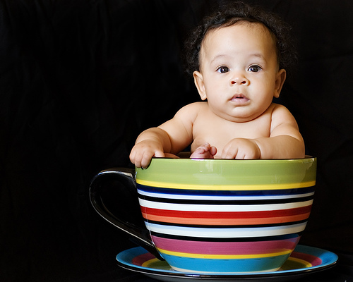 baby in teacup